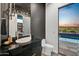 Powder room with pool view at 30505 N Sage Dr, Peoria, AZ 85383