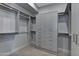 Large walk-in closet with ample shelving and drawers at 30505 N Sage Dr, Peoria, AZ 85383