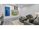 Relaxing sitting area with a large TV and comfortable seating at 30505 N Sage Dr, Peoria, AZ 85383