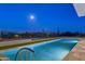 Relaxing pool at night with lights and fence at 30505 N Sage Dr, Peoria, AZ 85383