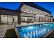 Luxury pool with artificial turf and modern home view at 30505 N Sage Dr, Peoria, AZ 85383