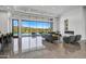 Spacious living room with fireplace, pool view, and high ceilings at 30505 N Sage Dr, Peoria, AZ 85383