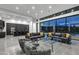 Open concept living area with modern kitchen and large windows at 30505 N Sage Dr, Peoria, AZ 85383