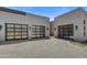 Exterior view of two-car garage with glass doors at 30505 N Sage Dr, Peoria, AZ 85383