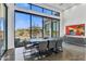 Bright dining room with large windows and seating for six at 30505 N Sage Dr, Peoria, AZ 85383