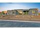 Contemporary home with large windows and stone accents at 30505 N Sage Dr, Peoria, AZ 85383