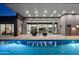 Modern backyard with pool and glass doors at 30505 N Sage Dr, Peoria, AZ 85383