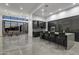 Modern kitchen with dark cabinetry and island seating at 30505 N Sage Dr, Peoria, AZ 85383