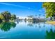 Stunning lake view with palm trees and residential buildings at 1825 W Ray Rd # 1001, Chandler, AZ 85224