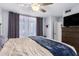 Spacious bedroom with king-size bed and access to balcony at 1825 W Ray Rd # 1001, Chandler, AZ 85224