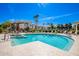 Inviting community pool with surrounding lounge chairs at 1825 W Ray Rd # 1001, Chandler, AZ 85224