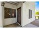 Building exterior with a brown door and window at 1825 W Ray Rd # 1001, Chandler, AZ 85224