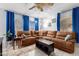 Comfortable living room with sectional sofa and window coverings at 1825 W Ray Rd # 1001, Chandler, AZ 85224