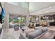 Open concept living space seamlessly merging kitchen and living room at 27016 N 14Th Ln, Phoenix, AZ 85085