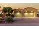 Two-story house with a two-car garage and desert landscaping at 13232 W Los Bancos Dr, Sun City West, AZ 85375