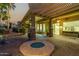 Outdoor patio with fire pit and built-in seating at 13232 W Los Bancos Dr, Sun City West, AZ 85375