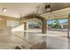 Two-car garage with automatic openers and view of street at 13232 W Los Bancos Dr, Sun City West, AZ 85375
