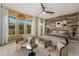 Main bedroom with accent wall and sitting area at 13232 W Los Bancos Dr, Sun City West, AZ 85375