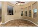 Bright breakfast nook with bay window and access to backyard at 13232 W Los Bancos Dr, Sun City West, AZ 85375