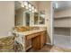 Bathroom boasts granite vanity and walk-in closet access at 13232 W Los Bancos Dr, Sun City West, AZ 85375