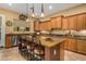 Spacious kitchen with large island and stainless steel appliances at 13232 W Los Bancos Dr, Sun City West, AZ 85375