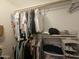 Well-organized closet with hanging rods and storage shelves at 8700 E University Dr # 2020, Mesa, AZ 85207