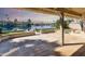 Spacious patio overlooking a serene lake with neighboring houses visible at 770 S Ocean Dr, Gilbert, AZ 85233