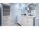 Elegant bathroom with double vanity and marble countertops at 1142 E Sunburst Ln, Tempe, AZ 85284