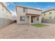 Two story home with a covered patio and small grassy backyard at 31751 N Velvet Rush Rd, San Tan Valley, AZ 85143