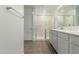 Bathroom with double vanity, shower, and tile flooring at 31751 N Velvet Rush Rd, San Tan Valley, AZ 85143