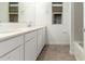 Bathroom with double vanity and a bathtub at 31751 N Velvet Rush Rd, San Tan Valley, AZ 85143