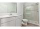 Clean bathroom with white vanity, a large mirror, and a glass shower at 31751 N Velvet Rush Rd, San Tan Valley, AZ 85143
