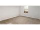 Bright bedroom with a window and carpet flooring at 31751 N Velvet Rush Rd, San Tan Valley, AZ 85143