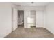 Bedroom with door to hallway and closet at 31751 N Velvet Rush Rd, San Tan Valley, AZ 85143