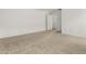 Spacious bedroom with neutral carpeting and ample natural light at 31751 N Velvet Rush Rd, San Tan Valley, AZ 85143