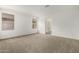 Bright bedroom with neutral carpeting and an ensuite bathroom at 31751 N Velvet Rush Rd, San Tan Valley, AZ 85143