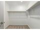 Large walk in closet with double rods at 31751 N Velvet Rush Rd, San Tan Valley, AZ 85143