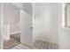 Clean hallway with patterned tile floor and access to other rooms at 31751 N Velvet Rush Rd, San Tan Valley, AZ 85143