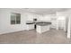 Modern kitchen with island, stainless steel appliances, and white cabinetry at 31751 N Velvet Rush Rd, San Tan Valley, AZ 85143