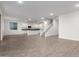 Open concept living area with kitchen and stairs at 31751 N Velvet Rush Rd, San Tan Valley, AZ 85143