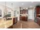 Kitchen features granite countertops, ample cabinetry, and stainless steel appliances at 28694 N 127Th Ln, Peoria, AZ 85383