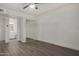 Well-lit bedroom with ceiling fan and mirrored closet at 18202 Cave Creek Rd # 141, Phoenix, AZ 85032