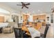 Kitchen with light wood cabinets, granite island, and stainless steel appliances at 33231 N 72Nd Pl, Scottsdale, AZ 85266