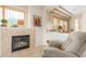Cozy fireplace with a seating area, perfect for relaxing evenings at 33231 N 72Nd Pl, Scottsdale, AZ 85266