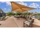 Relaxing shaded patio area with comfortable seating at 33231 N 72Nd Pl, Scottsdale, AZ 85266