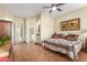 Spacious bedroom with a king-size bed and access to the bathroom at 33231 N 72Nd Pl, Scottsdale, AZ 85266