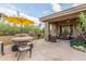 Outdoor kitchen and dining area with a large patio, great for summer barbecues at 33231 N 72Nd Pl, Scottsdale, AZ 85266