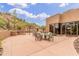 Outdoor patio with seating, grill, and desert views at 33231 N 72Nd Pl, Scottsdale, AZ 85266