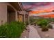 Landscaped side yard with pathway, desert plants, and sunset view at 33231 N 72Nd Pl, Scottsdale, AZ 85266