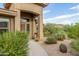 Landscaped front yard with desert plants and walkway to entryway at 33231 N 72Nd Pl, Scottsdale, AZ 85266